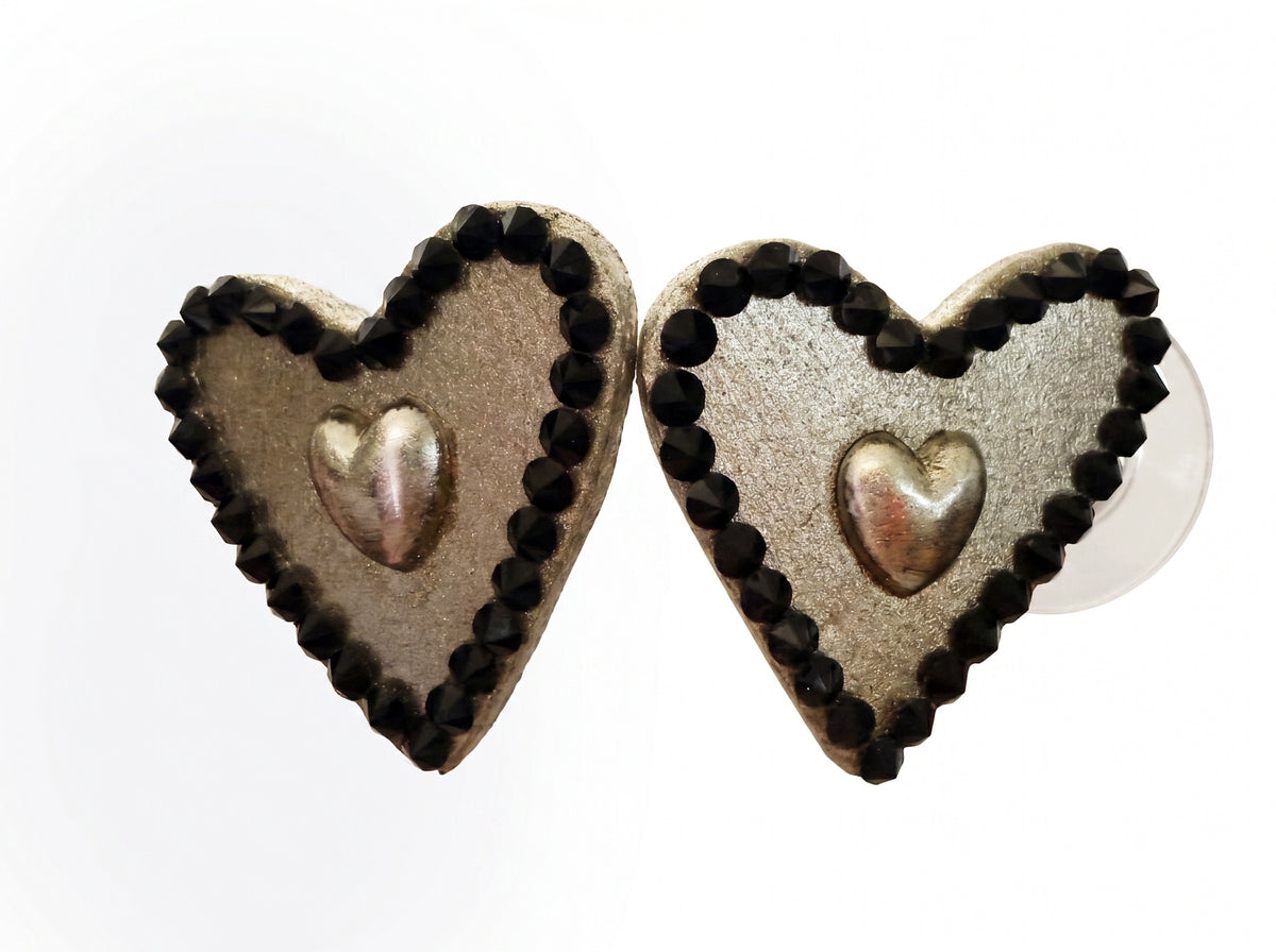 Aros corazón apegados