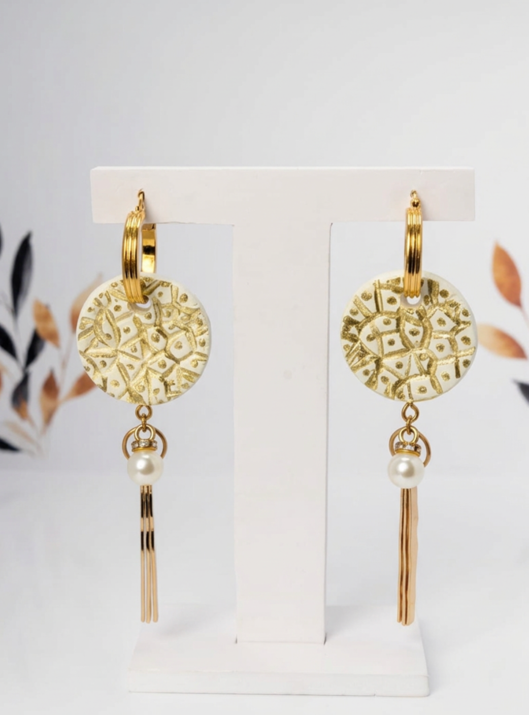 Aros colgantes dorados acero