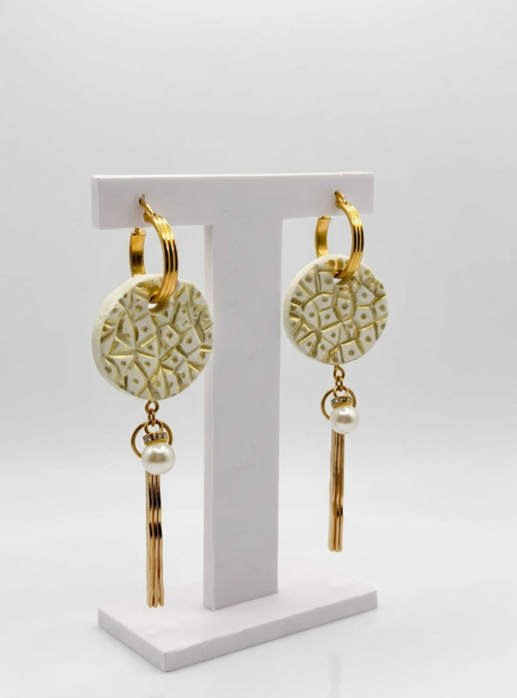 Aros colgantes dorados acero