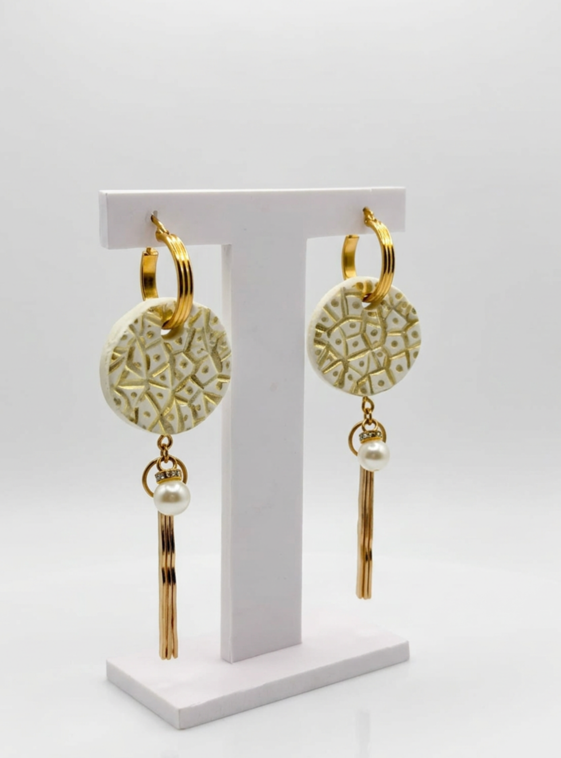 Aros colgantes dorados acero