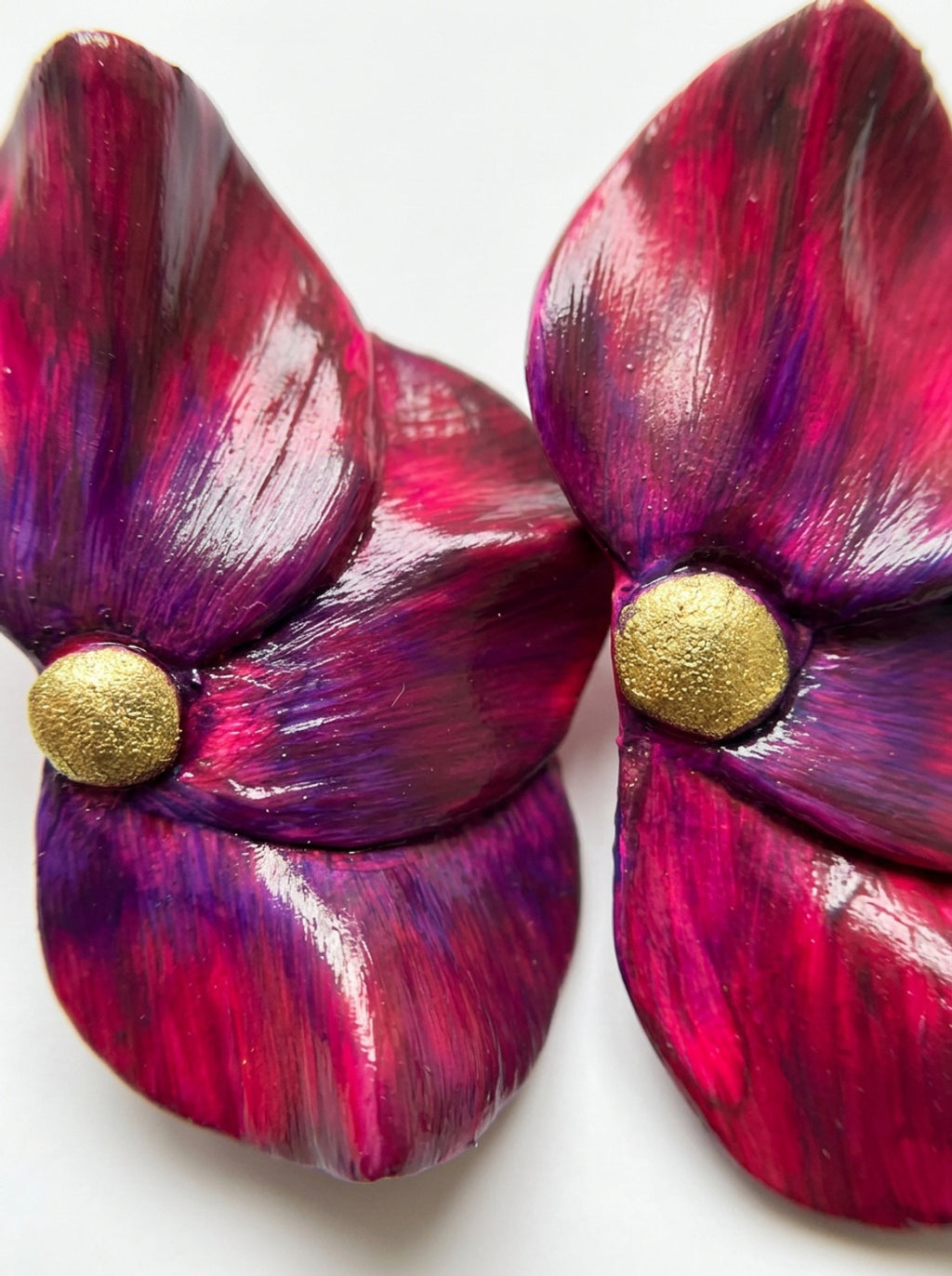 Aros petalos burdeos